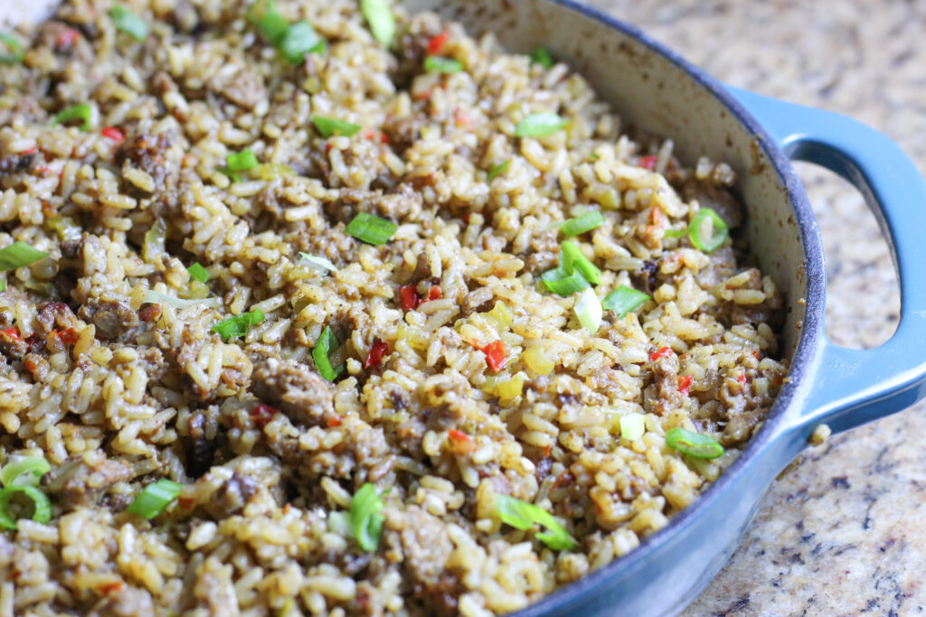 Dirty Rice Recipe shown in a large skillet.
